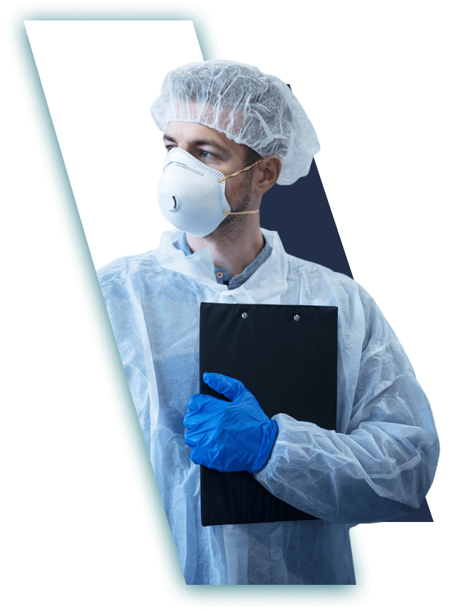 Operator or quality inspector wearing hair net and N95 mask and holding clipboard