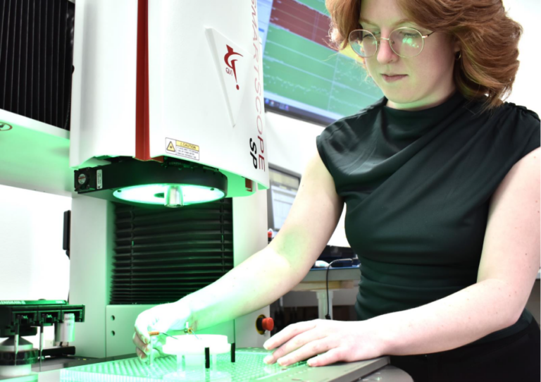 Engineer inspecting parts at a laser SmartScope